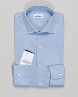 Refined merino jersey in a soft light blue. Alessandro Gherardi's signature piece combines breathability with a refined drape, ideal for layering or worn alone. Comfortable for everyday wear with the luxury feel of fine knitwear. Alessandro Gherardi Merino Jersey Shirt / Light Blue