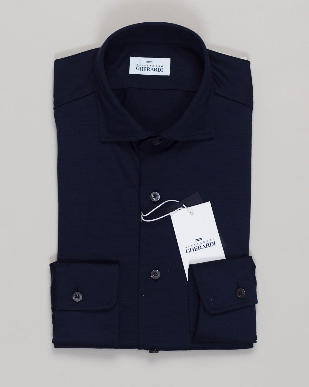 Lightweight merino jersey in navy, tailored for refined simplicity. Breathable natural fiber with subtle texture, designed for layering or standalone wear. Classic construction with modern comfort. Alessandro Gherardi Merino Jersey Shirt / Navy