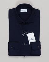 Lightweight merino jersey in navy, tailored for refined simplicity. Breathable natural fiber with subtle texture, designed for layering or standalone wear. Classic construction with modern comfort. Alessandro Gherardi Merino Jersey Shirt / Navy