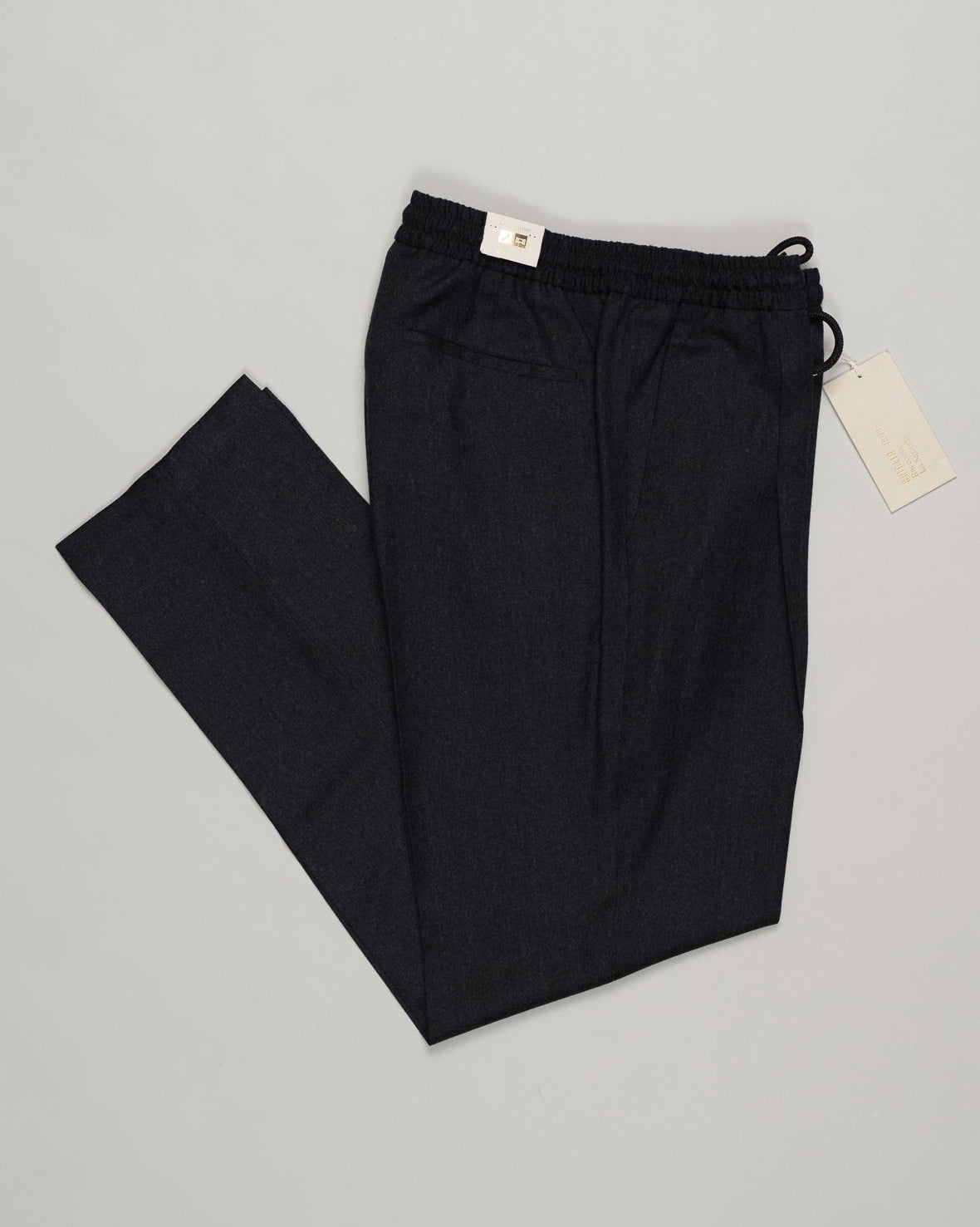 Italian tailoring meets everyday ease. These Briglia drawstring flannels in navy offer a relaxed fit with refined detailing. Soft flannel construction with an adjustable waist ensures comfort without compromise. Briglia Drawstring Flannel Trousers / Navy