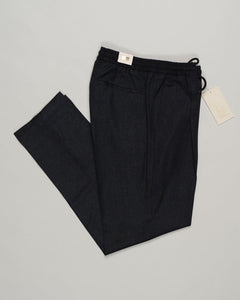 Italian tailoring meets everyday ease. These Briglia drawstring flannels in navy offer a relaxed fit with refined detailing. Soft flannel construction with an adjustable waist ensures comfort without compromise. Briglia Drawstring Flannel Trousers / Navy