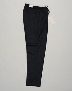 Italian tailoring meets everyday ease. These Briglia drawstring flannels in navy offer a relaxed fit with refined detailing. Soft flannel construction with an adjustable waist ensures comfort without compromise. Briglia Drawstring Flannel Trousers / Navy