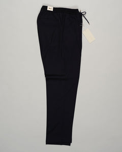 Italian tailoring meets everyday ease. These Briglia drawstring flannels in navy offer a relaxed fit with refined detailing. Soft flannel construction with an adjustable waist ensures comfort without compromise. Briglia Drawstring Flannel Trousers / Navy