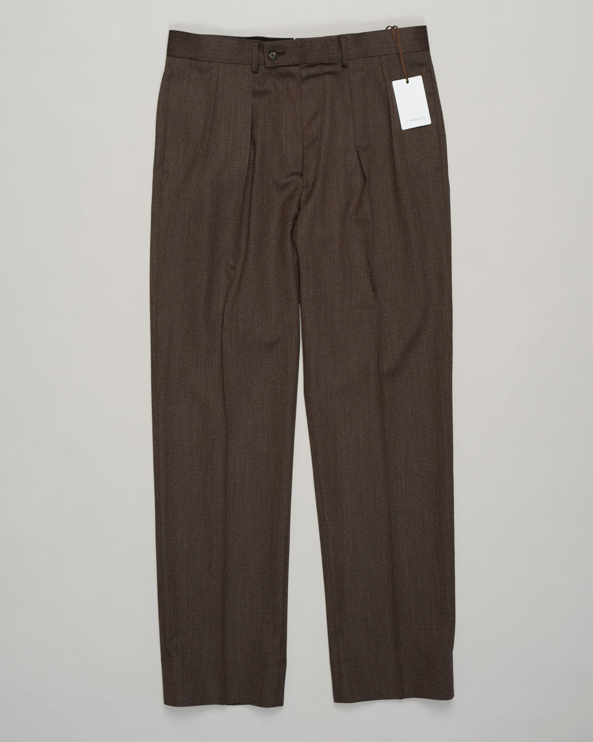 Impeccably tailored pleated trousers in rich brown covert wool. A Caruso signature, cut for refined silhouette and effortless elegance. Premium fabric with subtle texture, designed for versatility across formal and smart-casual occasions. Caruso Pleated Covert Wool Trousers / Brown