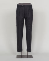 Berwich's Chiaia represents timeless tailoring craftsmanship. These wool covert trousers are cut from premium wool in classic black, designed for refined simplicity and enduring wear. The structured fabric offers subtle texture while maintaining elegance across seasons. A sophisticated foundation for curated wardrobes and versatile pairing with blazers, knitwear, and formal wear.