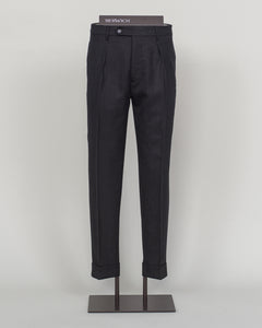 Berwich's Chiaia represents timeless tailoring craftsmanship. These wool covert trousers are cut from premium wool in classic black, designed for refined simplicity and enduring wear. The structured fabric offers subtle texture while maintaining elegance across seasons. A sophisticated foundation for curated wardrobes and versatile pairing with blazers, knitwear, and formal wear.