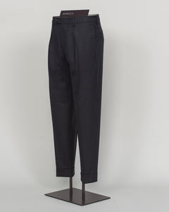 Berwich's Chiaia represents timeless tailoring craftsmanship. These wool covert trousers are cut from premium wool in classic black, designed for refined simplicity and enduring wear. The structured fabric offers subtle texture while maintaining elegance across seasons. A sophisticated foundation for curated wardrobes and versatile pairing with blazers, knitwear, and formal wear.