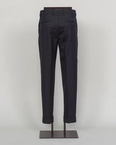 Berwich's Chiaia represents timeless tailoring craftsmanship. These wool covert trousers are cut from premium wool in classic black, designed for refined simplicity and enduring wear. The structured fabric offers subtle texture while maintaining elegance across seasons. A sophisticated foundation for curated wardrobes and versatile pairing with blazers, knitwear, and formal wear.
