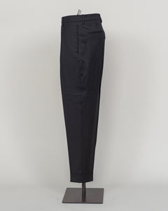 Italian tailoring meets modern comfort in these Berwich Chiaia long trousers. Crafted from a refined wool-stretch blend, they deliver a sharp, structured silhouette with the ease of movement essential for daily wear. The classic black colorway pairs seamlessly with blazers and shirts across seasons. Designed for the discerning man who values both precision fit and practical performance.