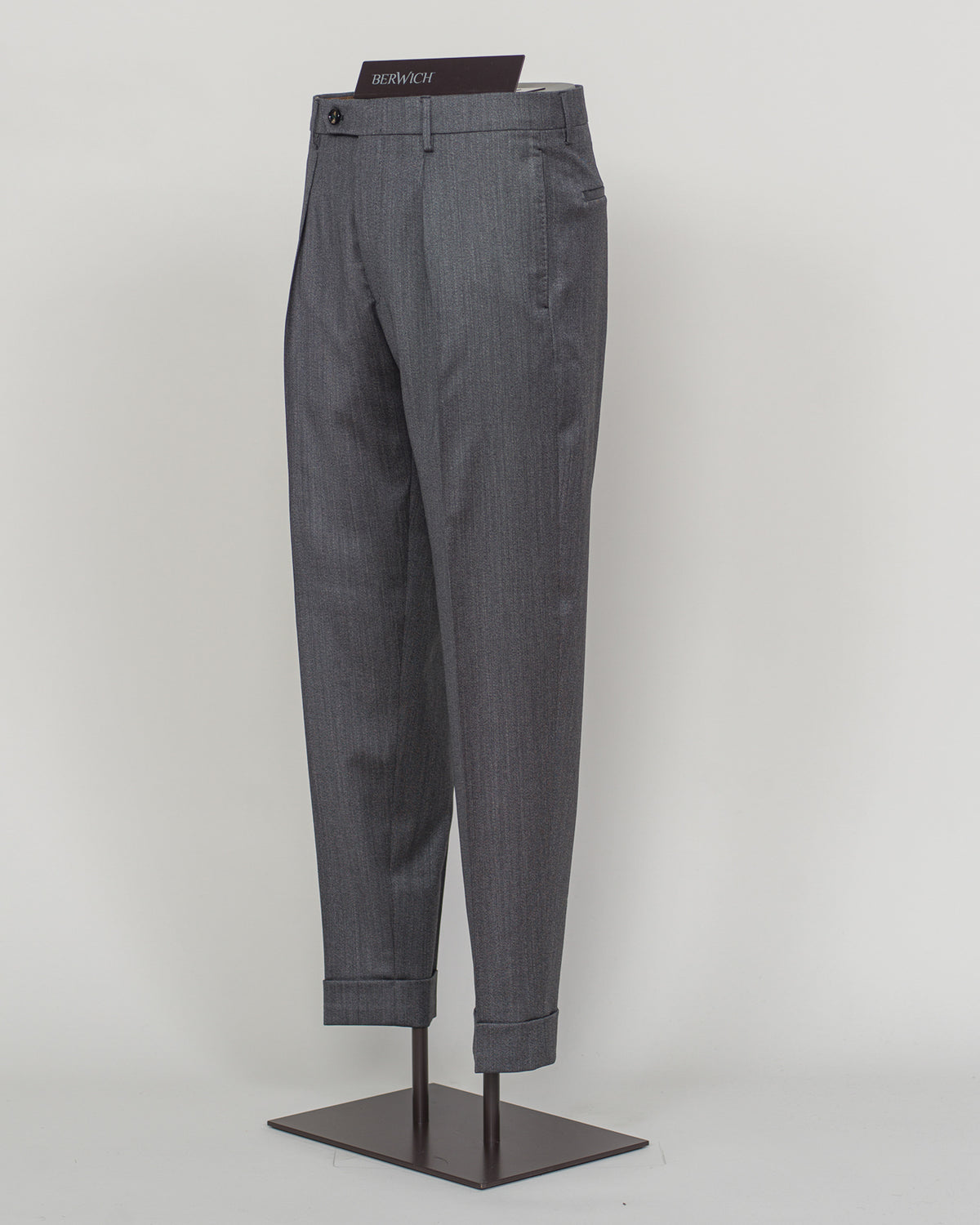 Italian tailoring meets contemporary comfort in these Berwich Chiaia trousers. Crafted from long-staple wool with subtle stretch, they drape with precision while moving with you. Grey provides versatile elegance across seasons. A refined foundation for tailored wardrobes.&nbsp;