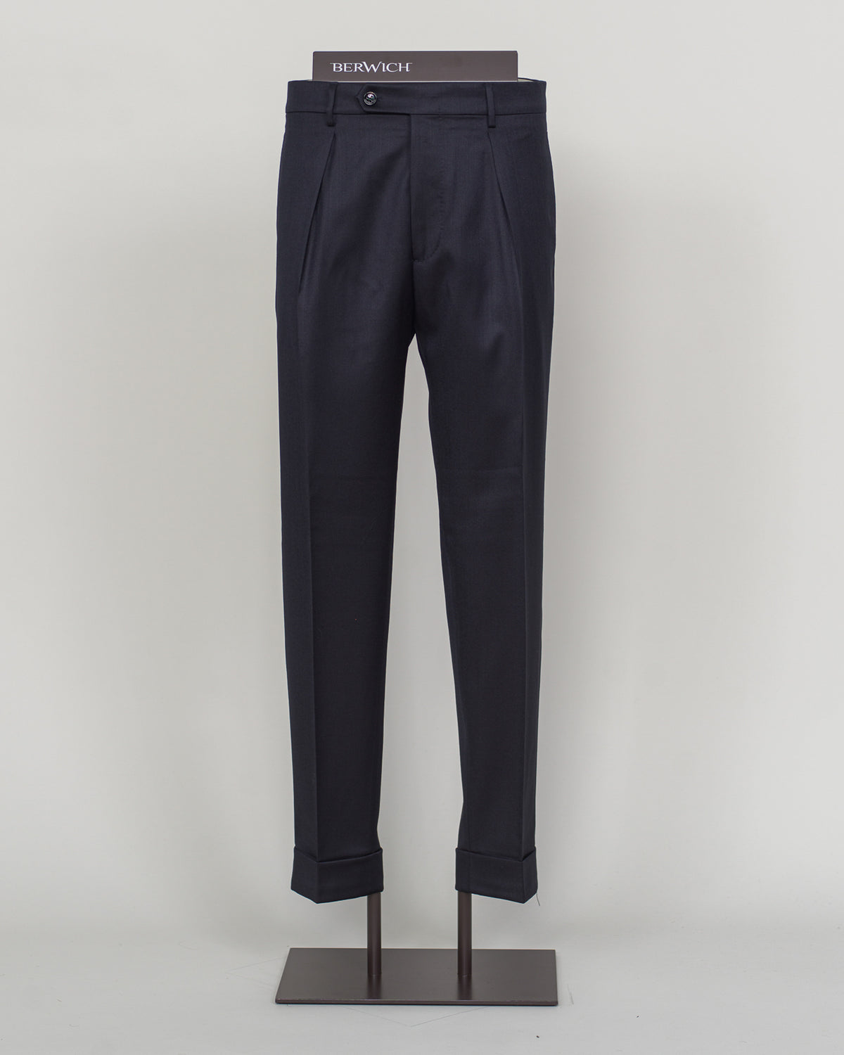 Italian tailoring meets contemporary comfort in these Berwich Chiaia trousers. Crafted from long-staple wool with subtle stretch, they drape with precision while moving with you. Navy provides versatile elegance across seasons. A refined foundation for tailored wardrobes.&nbsp;