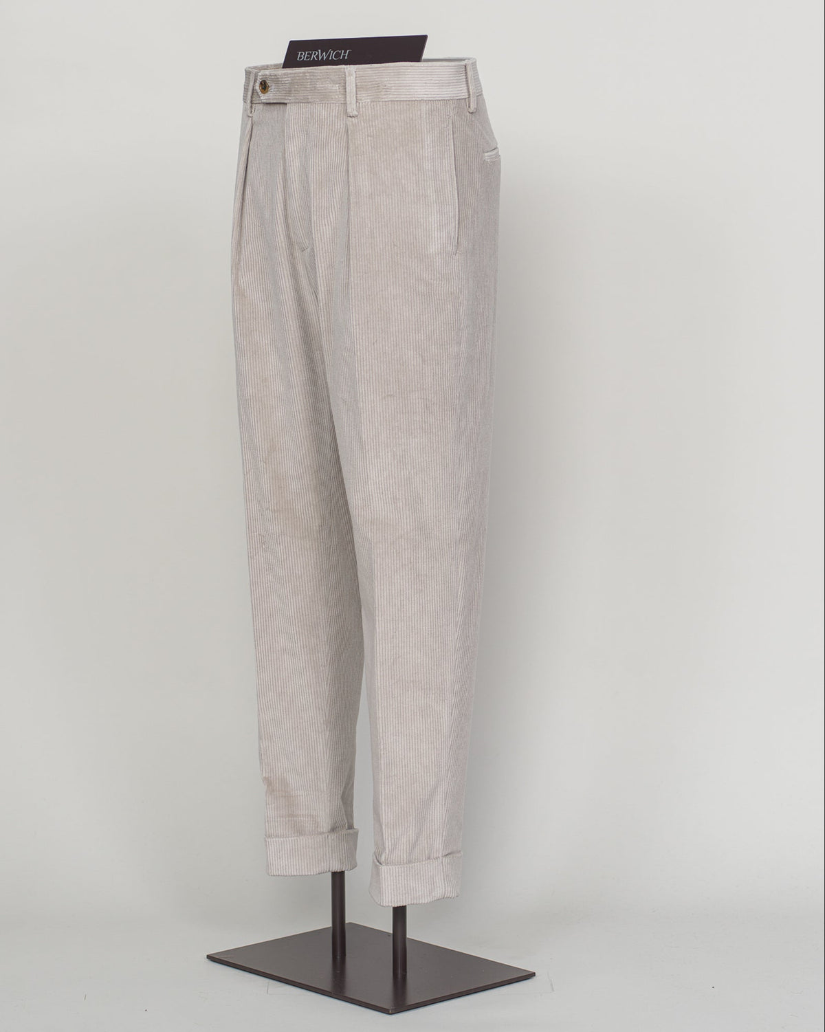 PIC 2 Berwich's Chiaia long trousers exemplify Italian tailoring craftsmanship in a light grey corduroy. The substantial fabric drapes with refined structure, offering both comfort and presence through seasons of wear. A classic silhouette built for the discerning wardrobe—versatile enough for business and relaxed enough for weekend elegance. Corduroy's textural depth pairs effortlessly with knitwear and structured blazers alike. Berwich Chiaia Long Corduroy Trousers / Light Grey