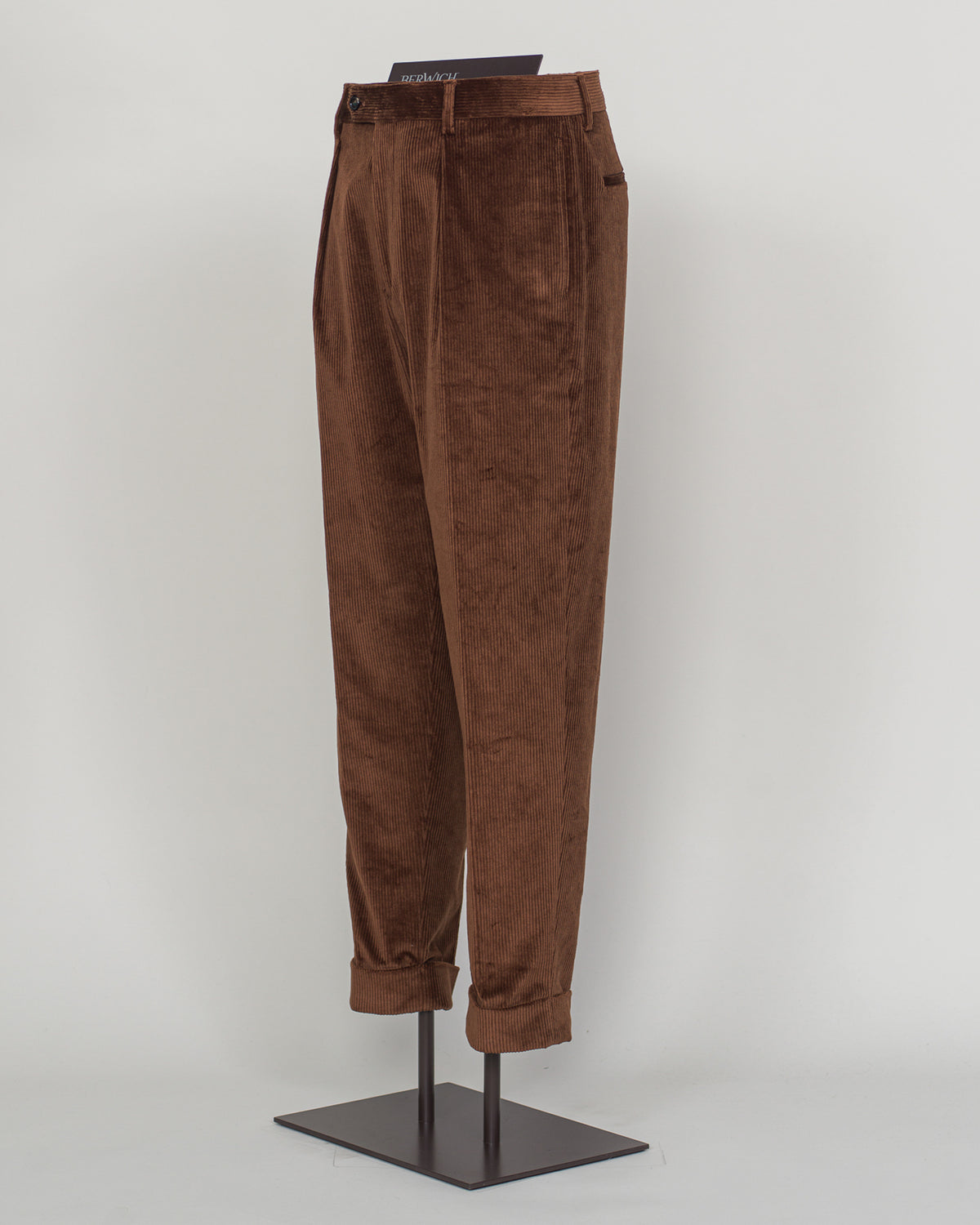 PIC 2 Berwich's Chiaia long trousers exemplify Italian tailoring craftsmanship in a warm biscuit corduroy. The substantial fabric drapes with refined structure, offering both comfort and presence through seasons of wear. A classic silhouette built for the discerning wardrobe—versatile enough for business and relaxed enough for weekend elegance. Corduroy's textural depth pairs effortlessly with knitwear and structured blazers alike. Berwich Chiaia Long Corduroy Trousers / Biscuit