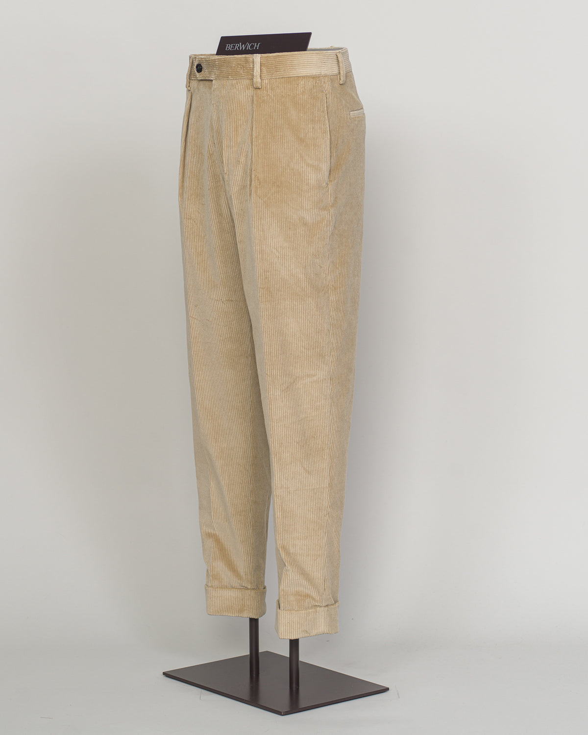 pic 2 Berwich's Chiaia Long trousers exemplify Italian tailoring craftsmanship in a versatile beige corduroy. The substantial fabric drapes with refined structure, offering both comfort and presence through seasons of wear. A classic silhouette built for the discerning wardrobe—versatile enough for business and relaxed enough for weekend elegance. Corduroy's textural depth pairs effortlessly with knitwear and structured blazers alike. Berwich Chiaia Long Corduroy Trousers / Beige