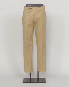 Berwich brushed cotton chinos deliver understated elegance and effortless versatility. The soft, matte finish of premium brushed cotton creates a refined texture that moves naturally, while the classic beige tone pairs seamlessly with neutral and jewel tones alike.

Cut for a modern fit with a tapered leg, these chinos offer comfort without compromise. The quality construction and timeless design make them a wardrobe essential—equally at home in the office or paired with a simple knit for weekend ease.