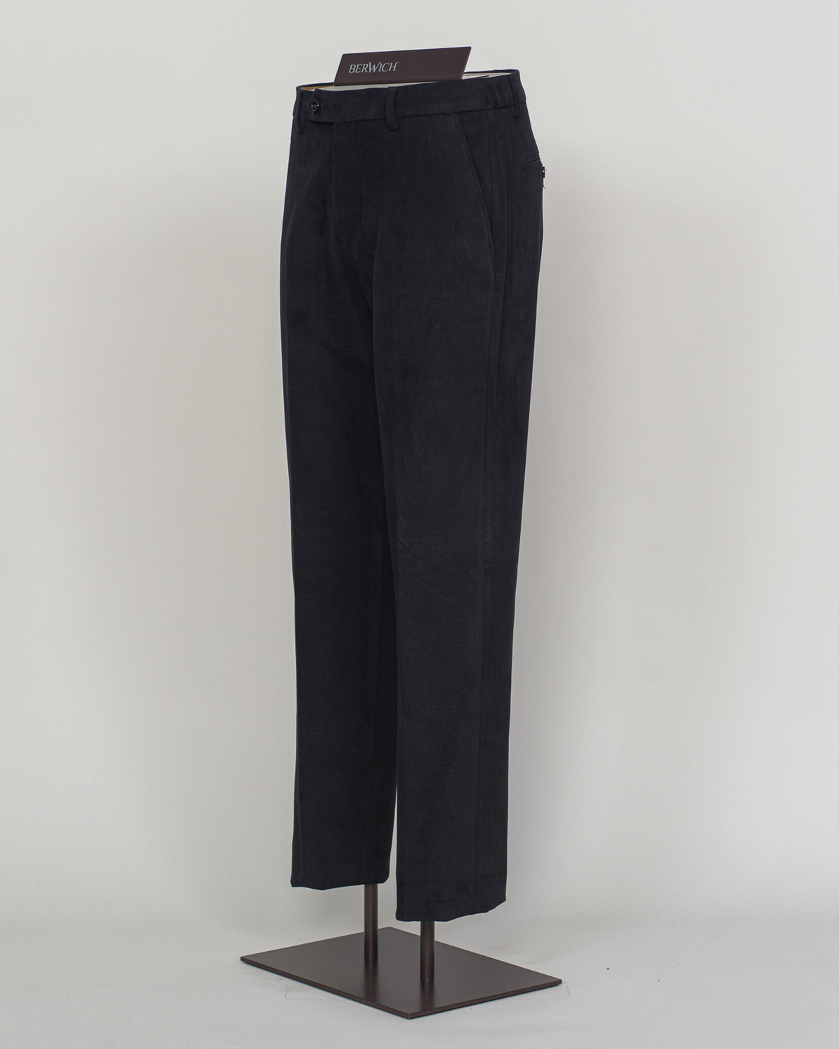 Crafted from premium brushed cotton, these Berwich chinos deliver understated elegance and exceptional comfort. The refined black fabric drapes with natural ease, while the soft hand feel makes them ideal for both tailored and relaxed occasions. A versatile foundation piece that pairs seamlessly with blazers, knitwear, or casual shirts. Classic tailoring meets modern sensibility in every stitch.