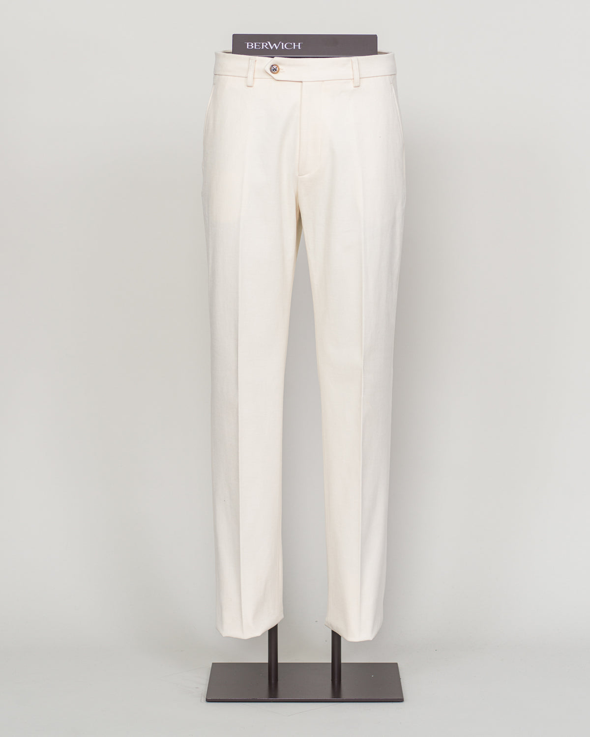 Understated elegance meets everyday comfort in these Berwich brushed cotton chinos. Crafted from soft, refined cotton with a subtle nap finish, they drape with a relaxed sophistication ideal for both casual weekends and smart-casual occasions. The clean white colorway pairs effortlessly with any palette. Cut for a modern fit that honors traditional tailoring principles, these chinos deliver the versatility and quality that define Berwich's Italian heritage.