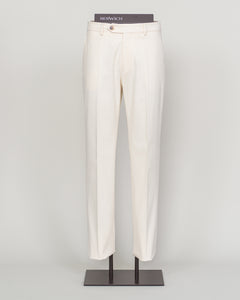 Understated elegance meets everyday comfort in these Berwich brushed cotton chinos. Crafted from soft, refined cotton with a subtle nap finish, they drape with a relaxed sophistication ideal for both casual weekends and smart-casual occasions. The clean white colorway pairs effortlessly with any palette. Cut for a modern fit that honors traditional tailoring principles, these chinos deliver the versatility and quality that define Berwich's Italian heritage.
