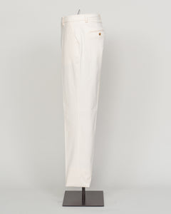 Understated elegance meets everyday comfort in these Berwich brushed cotton chinos. Crafted from soft, refined cotton with a subtle nap finish, they drape with a relaxed sophistication ideal for both casual weekends and smart-casual occasions. The clean white colorway pairs effortlessly with any palette. Cut for a modern fit that honors traditional tailoring principles, these chinos deliver the versatility and quality that define Berwich's Italian heritage.