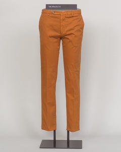 Berwich's Vulcano chinos exemplify Italian craftsmanship with their garment-dyed arancio hue, delivering depth and character that evolves with wear. Cut in a refined, contemporary fit, these chinos balance structure with comfort—ideal for refined casual dressing and smart-casual occasions. The garment-dye process ensures each pair develops its own patina, making them a versatile investment piece for a discerning wardrobe. Pair with lightweight knitwear or classic shirting for effortless sophistication. Berw