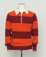 A timeless rugby polo crafted from pure wool, featuring Harley of Scotland's signature striped pattern in warm orange and red tones. The structured knit delivers excellent breathability and natural temperature regulation, ideal for layering or standalone wear. Classic collar and button placket with a relaxed yet refined fit that suits both casual and smart-casual settings. A versatile staple for the discerning wardrobe.