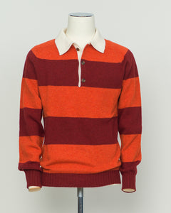 A timeless rugby polo crafted from pure wool, featuring Harley of Scotland's signature striped pattern in warm orange and red tones. The structured knit delivers excellent breathability and natural temperature regulation, ideal for layering or standalone wear. Classic collar and button placket with a relaxed yet refined fit that suits both casual and smart-casual settings. A versatile staple for the discerning wardrobe.