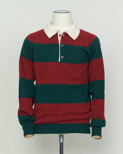 A timeless rugby polo crafted from pure wool by Harley of Scotland. The bold red and green striped pattern embodies classic Scottish heritage and collegiate charm. Structured knit construction delivers durability and shape retention, while the natural breathability of wool adapts to layering and seasonal transitions. Perfect for the discerning wearer who values authentic craftsmanship and understated sophistication.