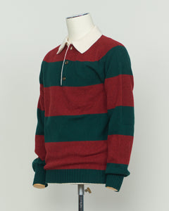 A timeless rugby polo crafted from pure wool by Harley of Scotland. The bold red and green striped pattern embodies classic Scottish heritage and collegiate charm. Structured knit construction delivers durability and shape retention, while the natural breathability of wool adapts to layering and seasonal transitions. Perfect for the discerning wearer who values authentic craftsmanship and understated sophistication.