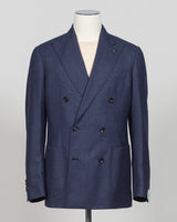 Crafted by Luigi Borrelli, this double breasted blazer in dark blue exemplifies Italian tailoring excellence. The structured silhouette and refined details showcase the brand's mastery of classic menswear construction. Ideal for elevating both business and sophisticated casual wardrobes, this piece pairs seamlessly with dress trousers, chinos, or tailored denim. The versatile dark blue tone ensures year round styling flexibility and enduring relevance in any discerning gentleman's collection.

Perfect for c