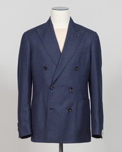 Crafted by Luigi Borrelli, this double breasted blazer in dark blue exemplifies Italian tailoring excellence. The structured silhouette and refined details showcase the brand's mastery of classic menswear construction. Ideal for elevating both business and sophisticated casual wardrobes, this piece pairs seamlessly with dress trousers, chinos, or tailored denim. The versatile dark blue tone ensures year round styling flexibility and enduring relevance in any discerning gentleman's collection.

Perfect for c
