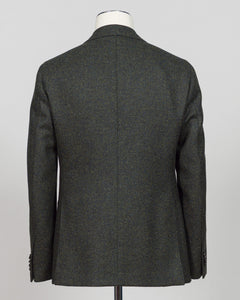 The back view of a dark gray textured tweed blazer displayed on a mannequin torso against a light gray  A timeless sport jacket tailored for refined occasions. This Caruso tweed delivers sophisticated texture in a rich dark green, anchoring tailored looks with understated elegance. The natural fiber construction promises durability and breathability, while the classic cut pairs seamlessly with dress trousers or smart casual wear.

Caruso's meticulous craftsmanship ensures a jacket built to last—obackground.