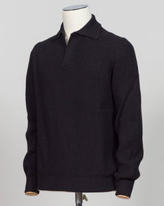 A dark charcoal gray ribbed knit polo sweater displayed on a white mannequin torso against a light gray background.  A refined essentials piece crafted from premium ribbed knit. The Gran Sasso polo delivers timeless elegance through its structured fabric and clean lines — perfect for layering or worn alone. Black colourway suits any wardrobe foundation. Gran Sasso Ribbed Polo / Black