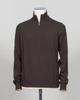 Gran Sasso Half-Zip Knit in rich dark brown, a timeless layering essential for the refined wardrobe. This Italian-crafted piece offers sophisticated simplicity with a comfortable half-zip construction, perfect for transitional styling. The knit's subtle texture and classic colorway pair effortlessly with tailored trousers or casual wear. Expertly finished with attention to detail throughout, this sweater delivers understated elegance and versatility season after season.