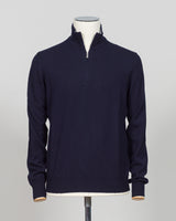 Elevate your everyday layering with this essential half-zip knit from Gran Sasso. Crafted from premium Italian yarn, the navy colorway offers versatility across seasons and occasions. The half-zip silhouette provides adaptable warmth, while the refined construction delivers the understated luxury Gran Sasso is known for. Perfect for layering beneath tailored blazers or wearing standalone with dress trousers.