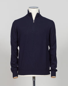Elevate your everyday layering with this essential half-zip knit from Gran Sasso. Crafted from premium Italian yarn, the navy colorway offers versatility across seasons and occasions. The half-zip silhouette provides adaptable warmth, while the refined construction delivers the understated luxury Gran Sasso is known for. Perfect for layering beneath tailored blazers or wearing standalone with dress trousers.