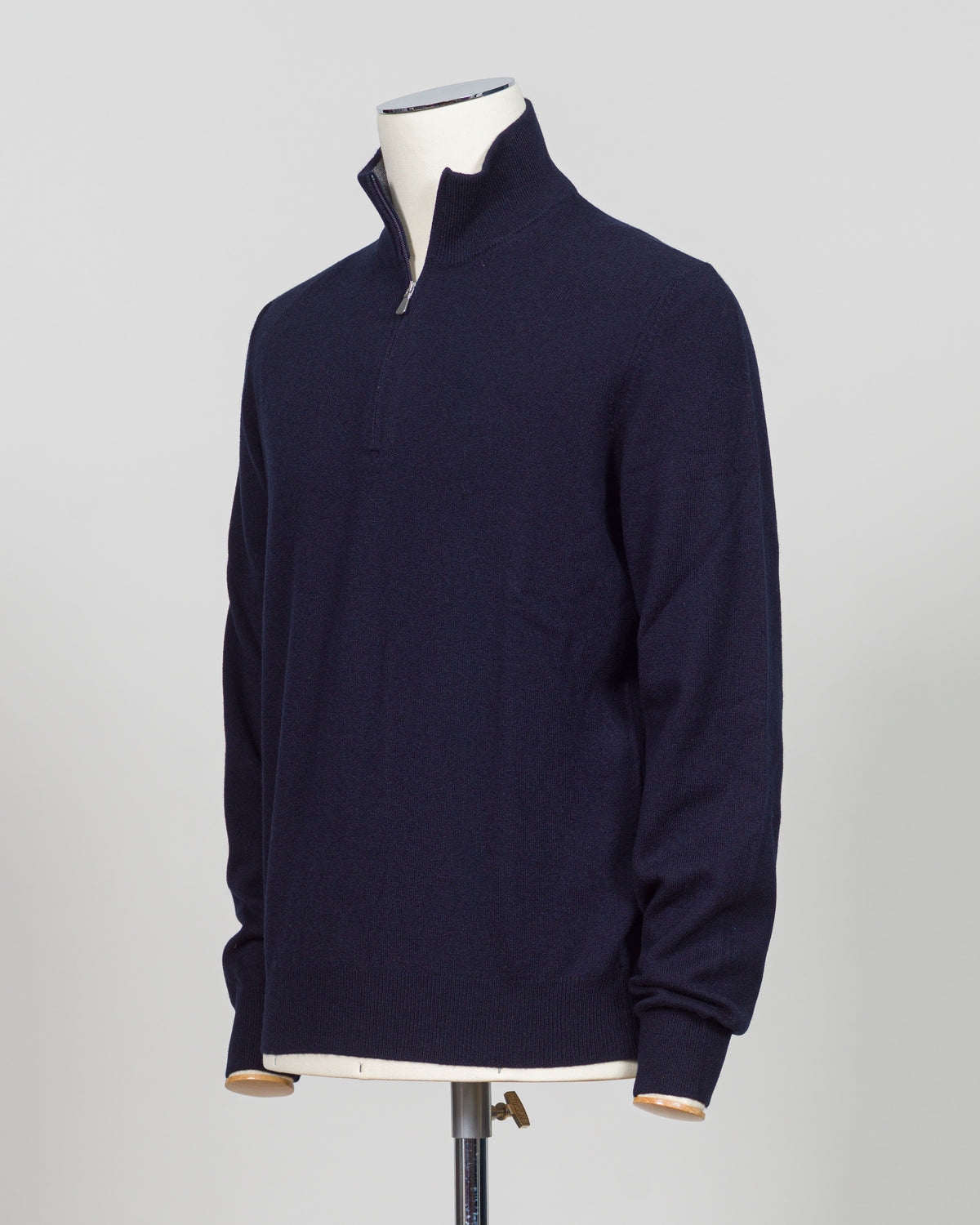 Elevate your everyday layering with this essential half-zip knit from Gran Sasso. Crafted from premium Italian yarn, the navy colorway offers versatility across seasons and occasions. The half-zip silhouette provides adaptable warmth, while the refined construction delivers the understated luxury Gran Sasso is known for. Perfect for layering beneath tailored blazers or wearing standalone with dress trousers.