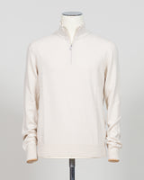 Refined Italian knitwear with timeless appeal. This Gran Sasso half-zip features a supple construction in bone white, designed for layering versatility and everyday sophistication. The relaxed silhouette pairs seamlessly with tailored trousers or casual wear, while premium yarn quality ensures durability and comfort through seasons of wear. A refined essential for the discerning wardrobe.