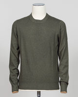 Italian luxury knitwear in a warm vintage dark green. Gran Sasso's refined crewneck delivers timeless sophistication with superior craftsmanship—a versatile layering piece that pairs effortlessly with tailored trousers or casual separates. Premium construction ensures lasting comfort and durability. Gran Sasso Vintage Crewneck / Dark Green