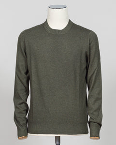 Italian luxury knitwear in a warm vintage dark green. Gran Sasso's refined crewneck delivers timeless sophistication with superior craftsmanship—a versatile layering piece that pairs effortlessly with tailored trousers or casual separates. Premium construction ensures lasting comfort and durability. Gran Sasso Vintage Crewneck / Dark Green