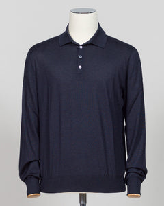 A dark navy blue long-sleeve polo shirt displayed on a white mannequin torso against a light gray background.  Italian craftsmanship meets refined versatility. This Gran Sasso polo blends wool, cashmere, and silk for a lightweight, luxurious knit that transitions effortlessly from casual to elevated dressing. The navy colorway pairs with virtually any tailoring. Premium construction and natural fiber content ensure durability and comfort across seasons. Gran Sasso Wool Cashmere &amp; Silk Polo / Navy