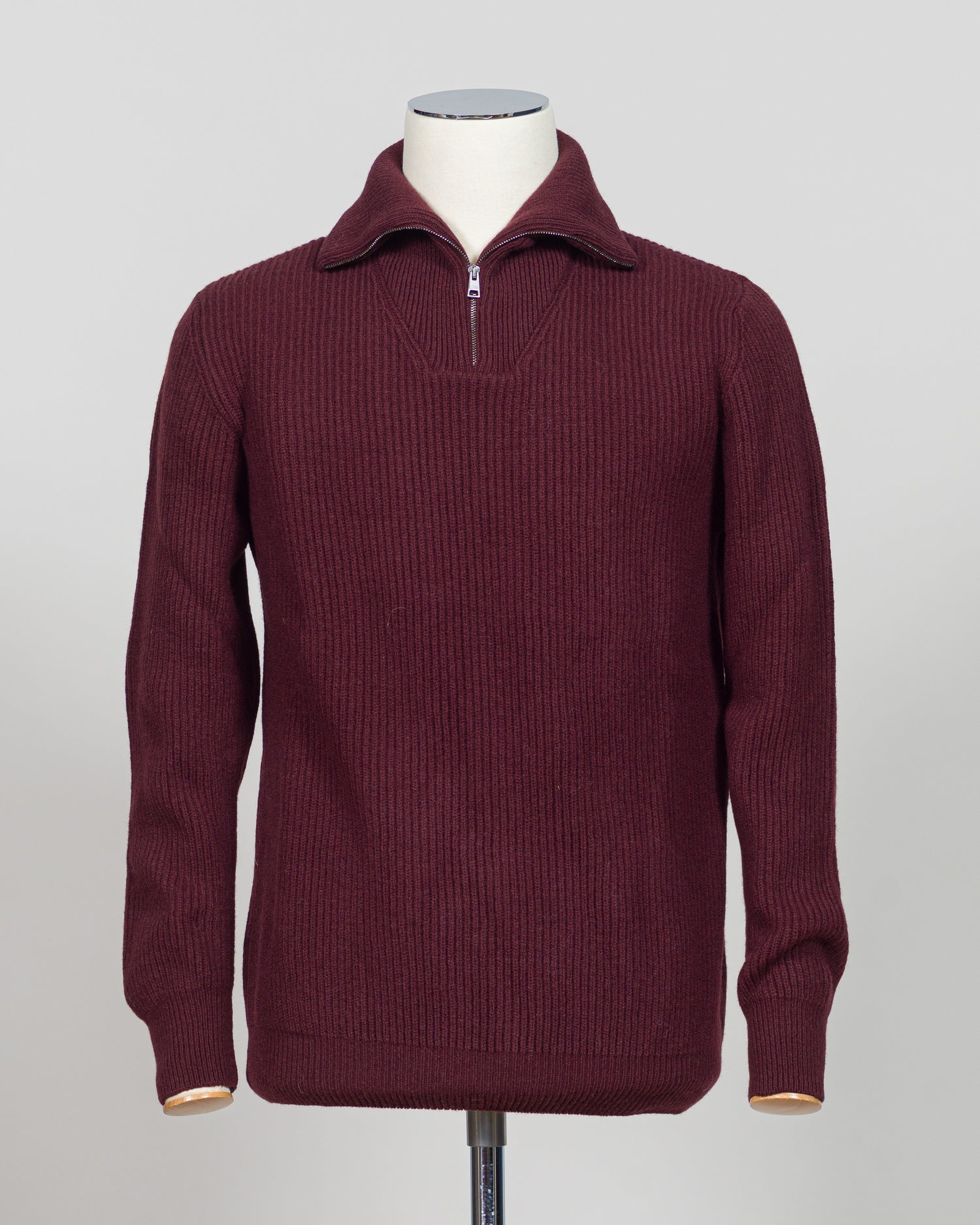 A timeless essential from G.R.P. Firenze, this ribbed half-zip knit combines refined Italian craftsmanship with versatile everyday wearability. The structured ribbed texture adds visual interest and dimension, while the half-zip design allows effortless layering and temperature control. Rendered in a sophisticated blue that transitions seamlessly from office to casual settings, this piece pairs equally well with tailored trousers or denim. A refined foundation for any discerning wardrobe.