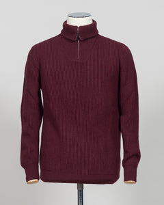 A timeless essential from G.R.P. Firenze, this ribbed half-zip knit combines refined Italian craftsmanship with versatile everyday wearability. The structured ribbed texture adds visual interest and dimension, while the half-zip design allows effortless layering and temperature control. Rendered in a sophisticated blue that transitions seamlessly from office to casual settings, this piece pairs equally well with tailored trousers or denim. A refined foundation for any discerning wardrobe.