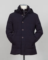 The Montecore Aerotwill Down Jacket combines lightweight insulation with weather-resistant performance. Crafted from premium aerotwill fabric, this navy jacket traps warmth without bulk, making it ideal for layering through transitional seasons or wearing as a standalone piece in mild conditions. The down fill provides responsive loft and compressibility for easy packing and storage. Cut with a refined silhouette that works seamlessly with tailored pieces, this jacket bridges casual functionality and polish