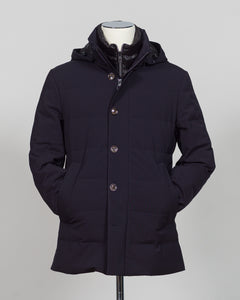The Montecore Aerotwill Down Jacket combines lightweight insulation with weather-resistant performance. Crafted from premium aerotwill fabric, this navy jacket traps warmth without bulk, making it ideal for layering through transitional seasons or wearing as a standalone piece in mild conditions. The down fill provides responsive loft and compressibility for easy packing and storage. Cut with a refined silhouette that works seamlessly with tailored pieces, this jacket bridges casual functionality and polish