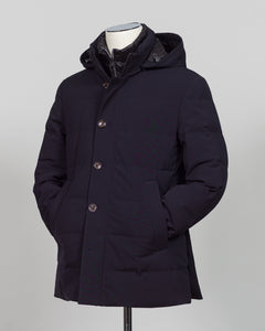 The Montecore Aerotwill Down Jacket combines lightweight insulation with weather-resistant performance. Crafted from premium aerotwill fabric, this navy jacket traps warmth without bulk, making it ideal for layering through transitional seasons or wearing as a standalone piece in mild conditions. The down fill provides responsive loft and compressibility for easy packing and storage. Cut with a refined silhouette that works seamlessly with tailored pieces, this jacket bridges casual functionality and polish
