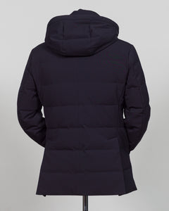 The Montecore Aerotwill Down Jacket combines lightweight insulation with weather-resistant performance. Crafted from premium aerotwill fabric, this navy jacket traps warmth without bulk, making it ideal for layering through transitional seasons or wearing as a standalone piece in mild conditions. The down fill provides responsive loft and compressibility for easy packing and storage. Cut with a refined silhouette that works seamlessly with tailored pieces, this jacket bridges casual functionality and polish