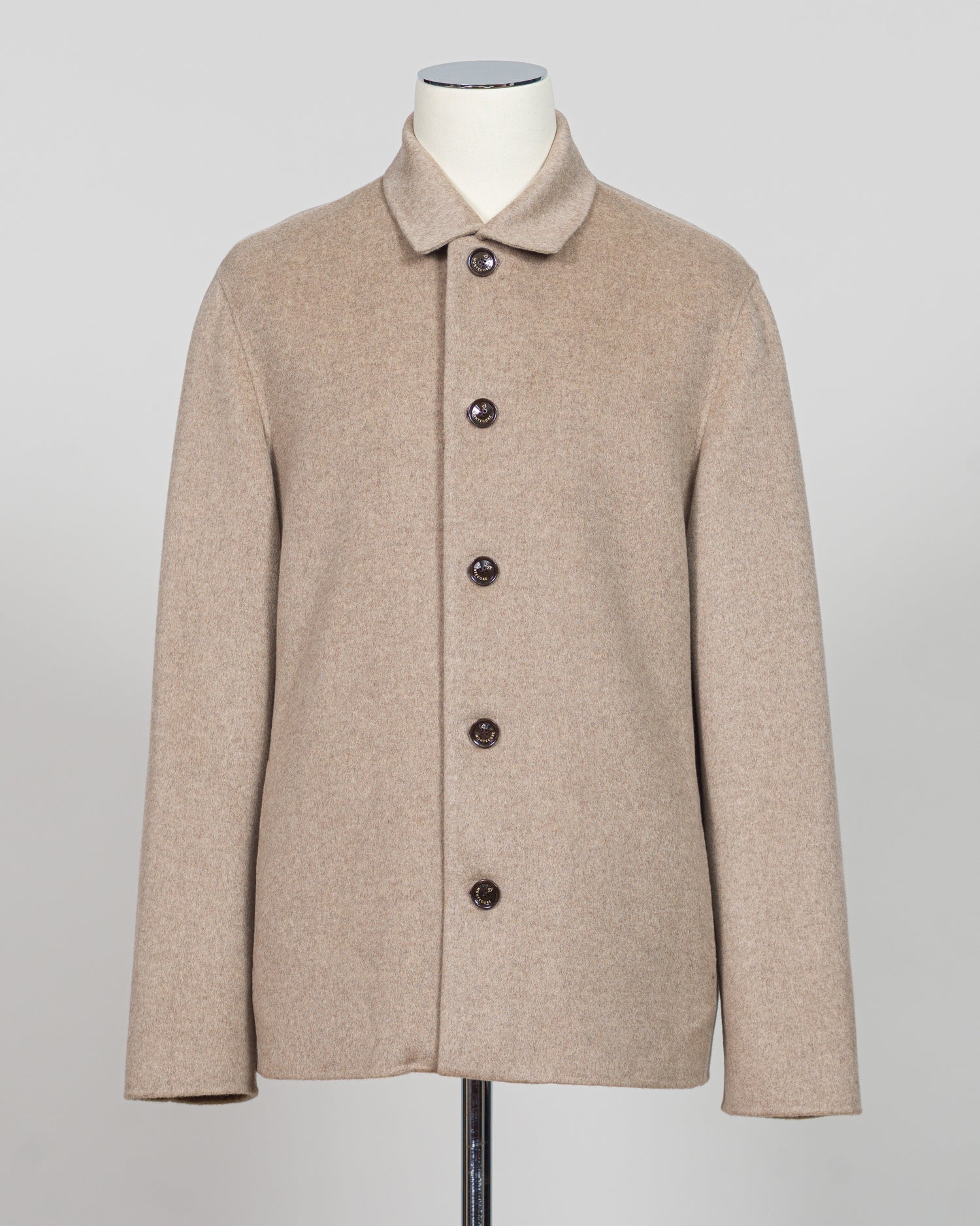 Elevate your essentials with the Montecore Cashmere Jacket in timeless beige. Crafted from pure cashmere, this luxurious layer delivers uncompromising softness and warmth for year-round sophistication. The refined silhouette pairs seamlessly with tailored trousers or relaxed separates, making it an investment piece that transcends seasons and trends. Expertly finished for longevity and comfort.