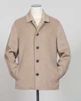 Elevate your essentials with the Montecore Cashmere Jacket in timeless beige. Crafted from pure cashmere, this luxurious layer delivers uncompromising softness and warmth for year-round sophistication. The refined silhouette pairs seamlessly with tailored trousers or relaxed separates, making it an investment piece that transcends seasons and trends. Expertly finished for longevity and comfort.