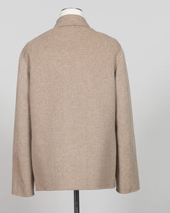 Elevate your essentials with the Montecore Cashmere Jacket in timeless beige. Crafted from pure cashmere, this luxurious layer delivers uncompromising softness and warmth for year-round sophistication. The refined silhouette pairs seamlessly with tailored trousers or relaxed separates, making it an investment piece that transcends seasons and trends. Expertly finished for longevity and comfort.