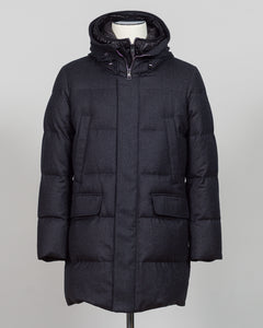 The Montecore VBC Flannel Down Coat delivers refined warmth with understated sophistication. Crafted from premium VBC flannel in deep charcoal grey, this jacket balances structure and comfort for versatile layering across seasons.

Filled with responsibly sourced down insulation, it provides exceptional thermal efficiency without excess bulk. The classic silhouette suits tailored wardrobes—layer it over dress shirts for office wear or pair casually with knitwear for weekend elegance.

VBC's heritage Italian